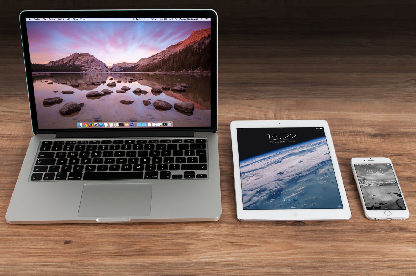 Landscape photo of a laptop and tablet on a desk for planning a digital freebie