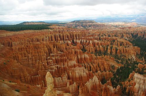 Free Breathtaking view of hoodoos at Bryce Canyon National Park under a cloudy sky, showcasing erosion and natural beauty. Stock Photo