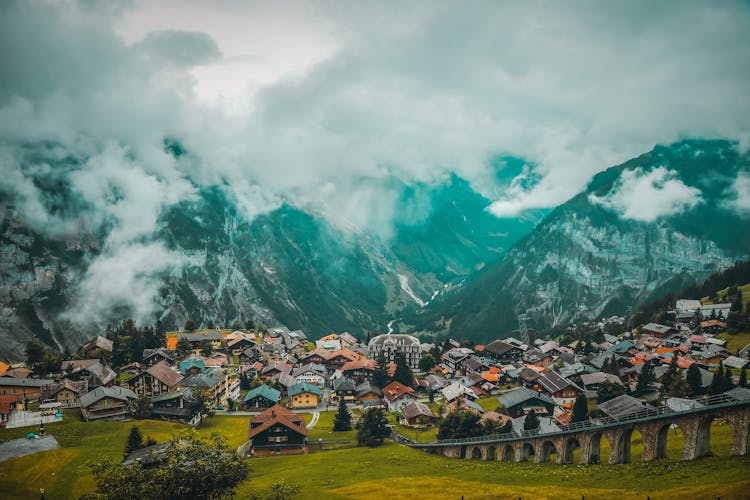 Houses Near The Swiss Mountains