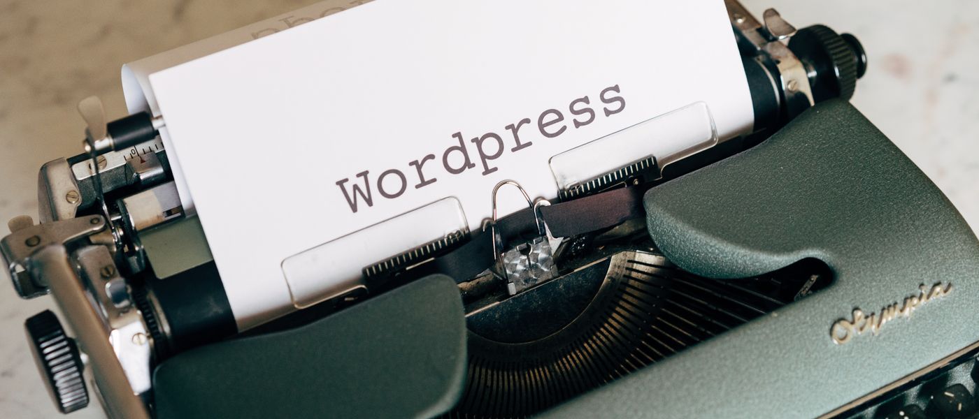 WordPress login screen with hacker code overlay, symbolizing miniOrange SAML exploit and cybersecurity SMB threat.