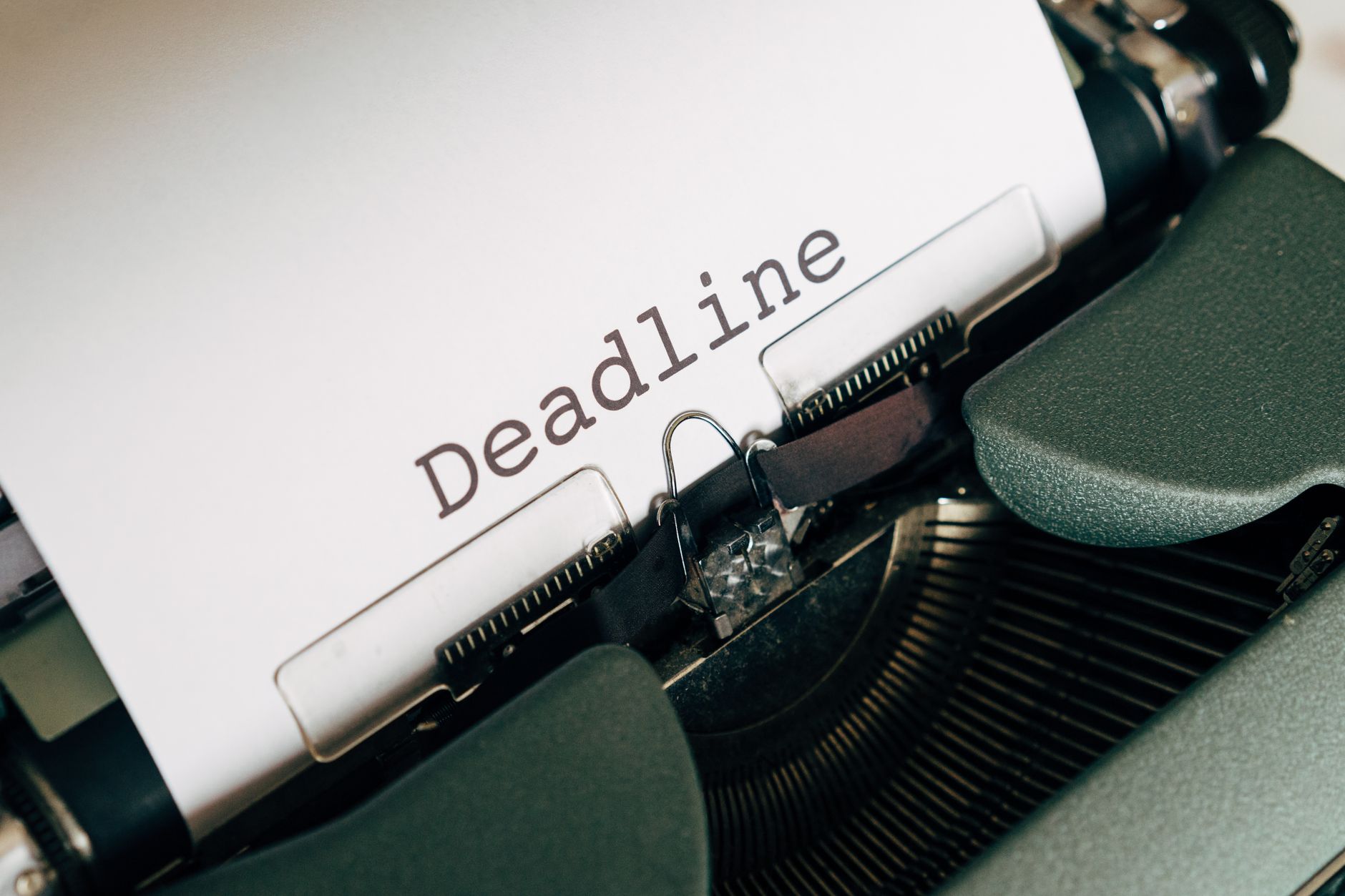 ADHD deadlines urgency focus & productivity adhd — woman journaling planner cozy bed soft morning light peaceful