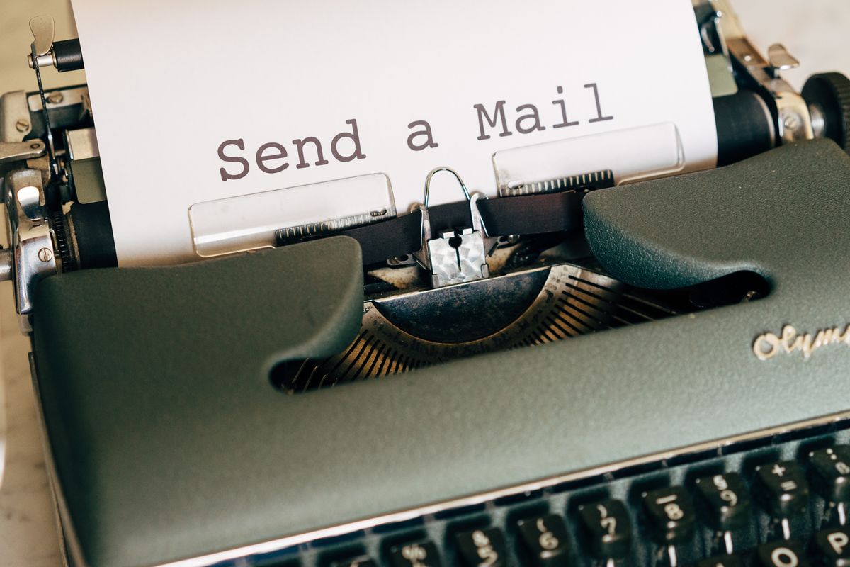 Typewriter typing the words Send a Mail