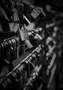 Padlocks Hanging on a Railing