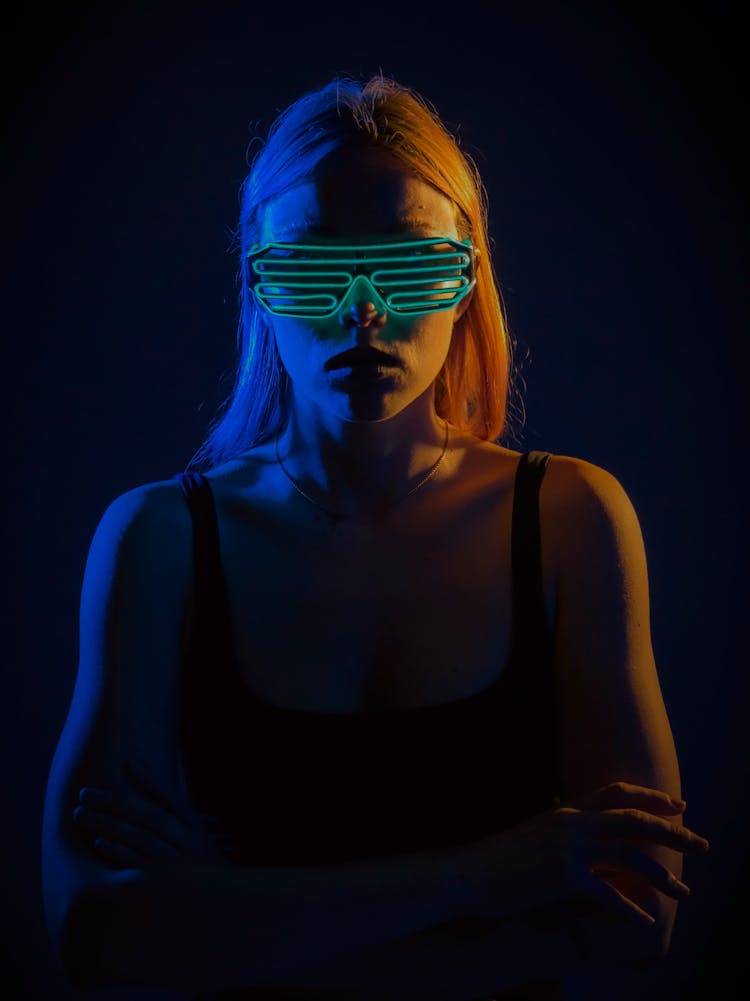 Woman In A Glow In The Dark Eyewear