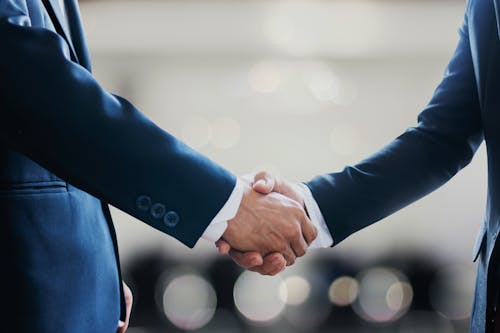 Free Persons in Black Suit Shaking Hands Stock Photo