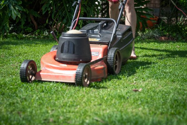 Commercial zero-turn mower on lawn