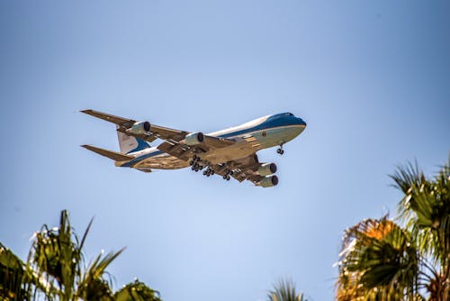 Boeing VC-25 Military Plane Flying Over Palm Trees