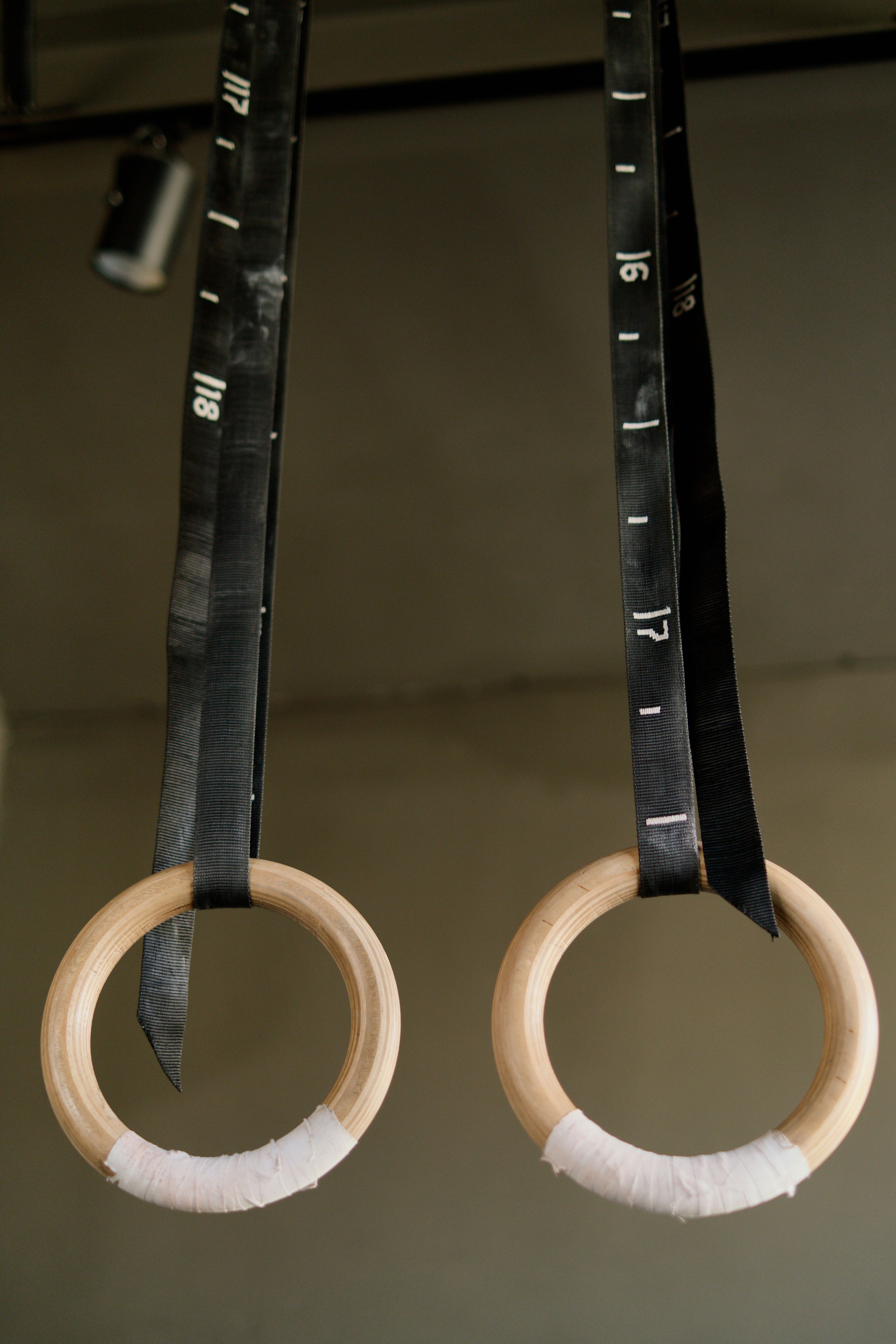Gymnastic rings hanging in the strength room