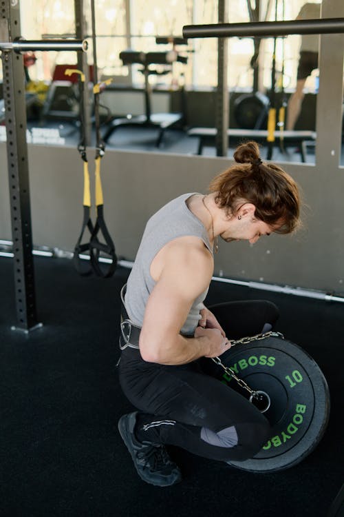 Man Exercising at a Gym