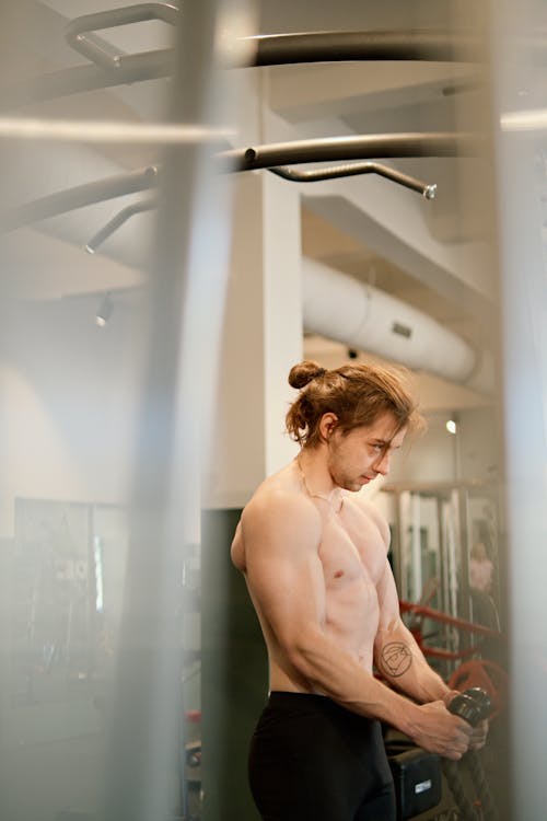 Free Topless Man Exercising at a Gym Stock Photo