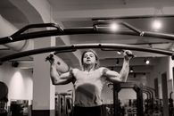 Man Doing Push Ups at the Gym