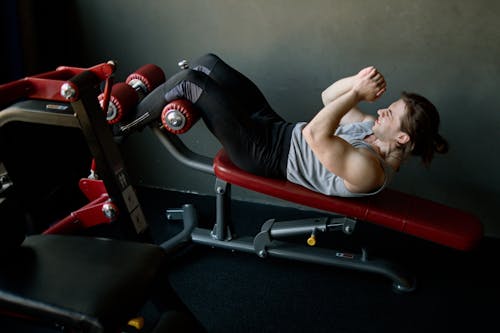 Free Man Exercising at a Gym Stock Photo
