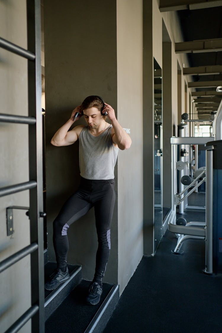 Man With Headphones At The Gym