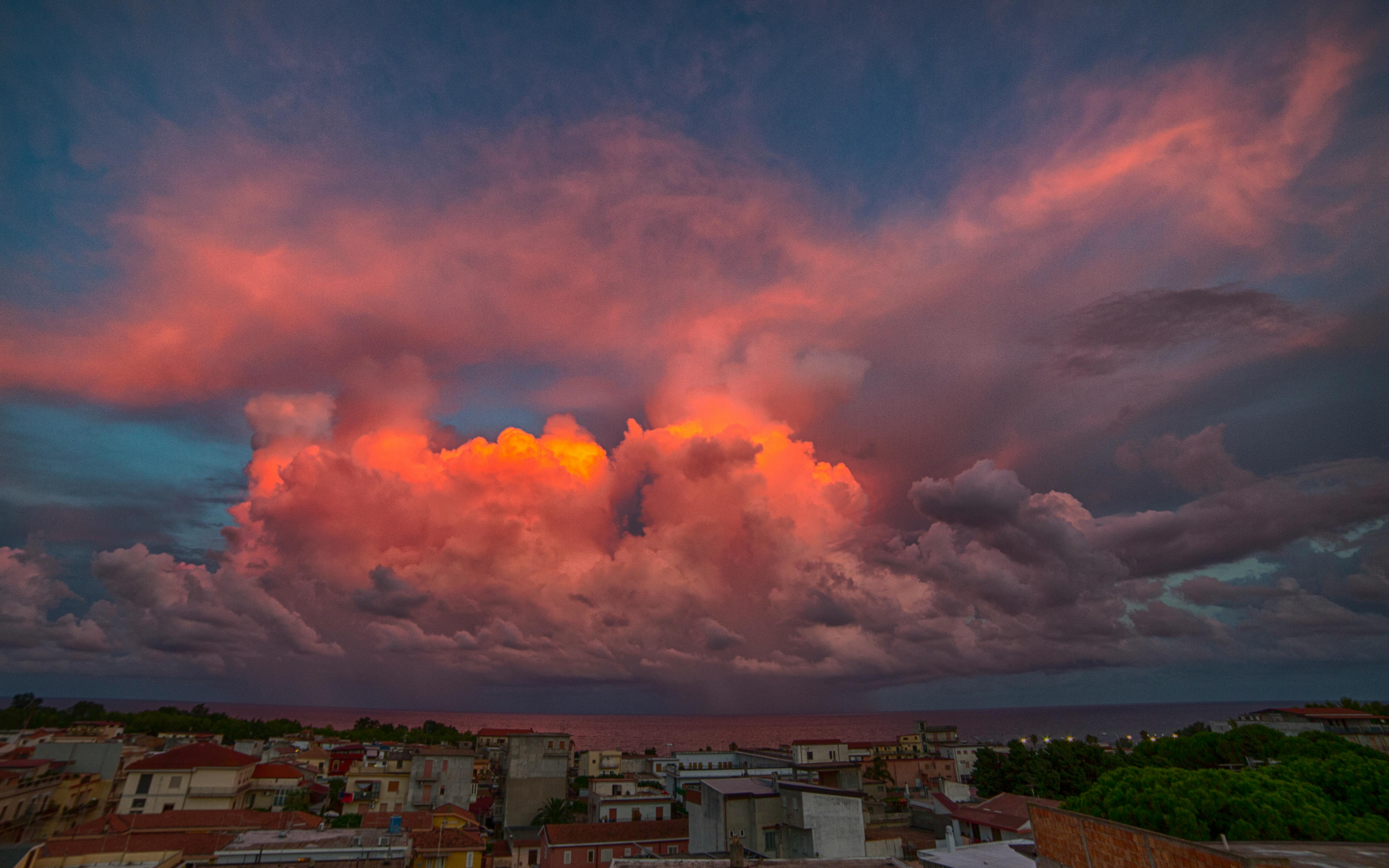 A person writing on a laptop
