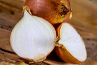 White Garlic on Brown Wooden Surface