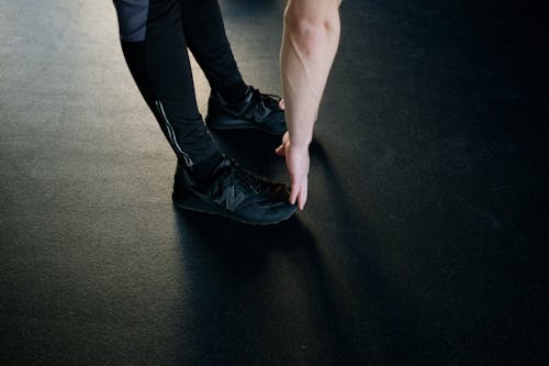 Person Touching his Feet