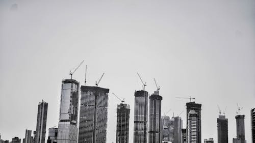 Grayscale Photo of High-Rise Buildings