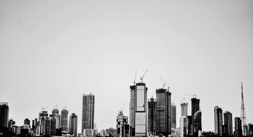 Free Urban skyline of Mumbai featuring modern skyscrapers in black and white. Stock Photo