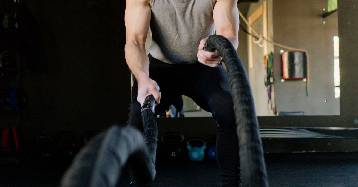 Guy Exercsing Man Exercising at a Gym · Free Stock Photo