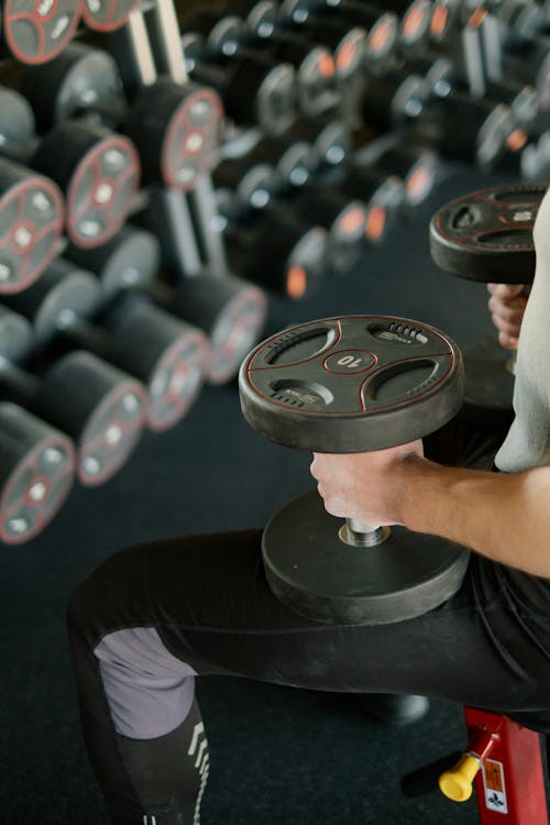 Free Person Holding Black Dumbbells Stock Photo