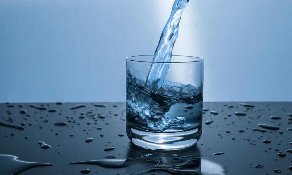 glass of fresh clean drinking water coastline