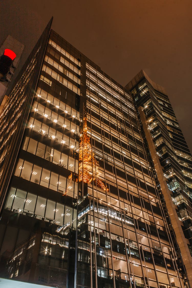 Modern Multistage Building Exterior In City At Night