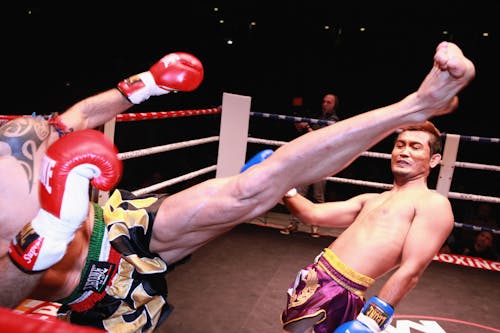Two Man Fighting in the Ring