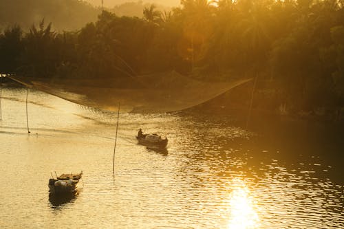 Gratis arkivbilde med båt, solnedgang