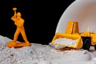 Yellow Plastic Toys in Close Up Shot