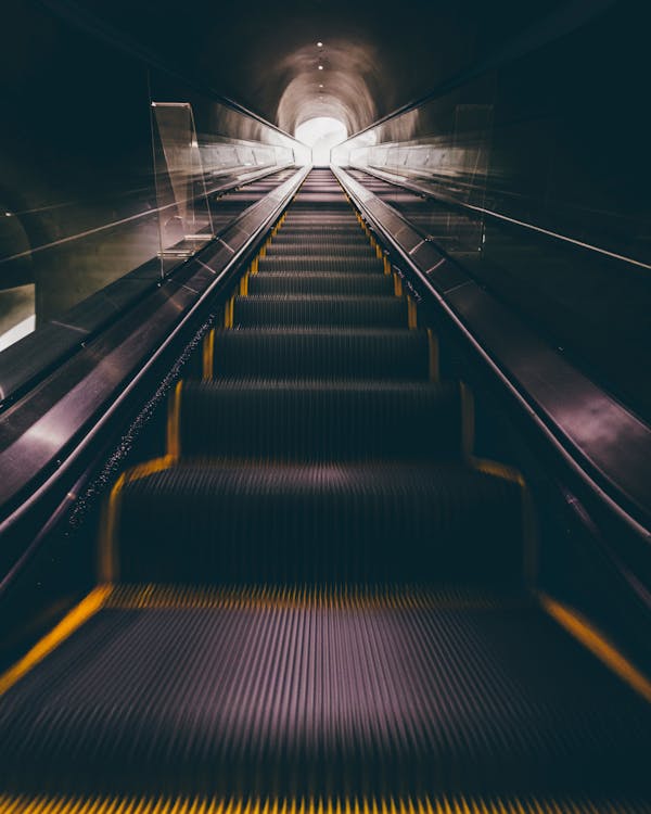 Free Low Angle Photography of Escalator Stock Photo