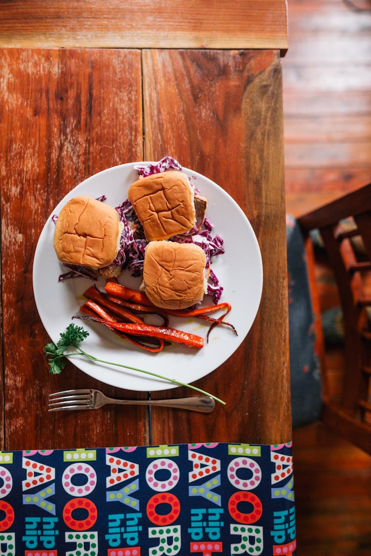 Delicious Sliders Served On Wooden Table