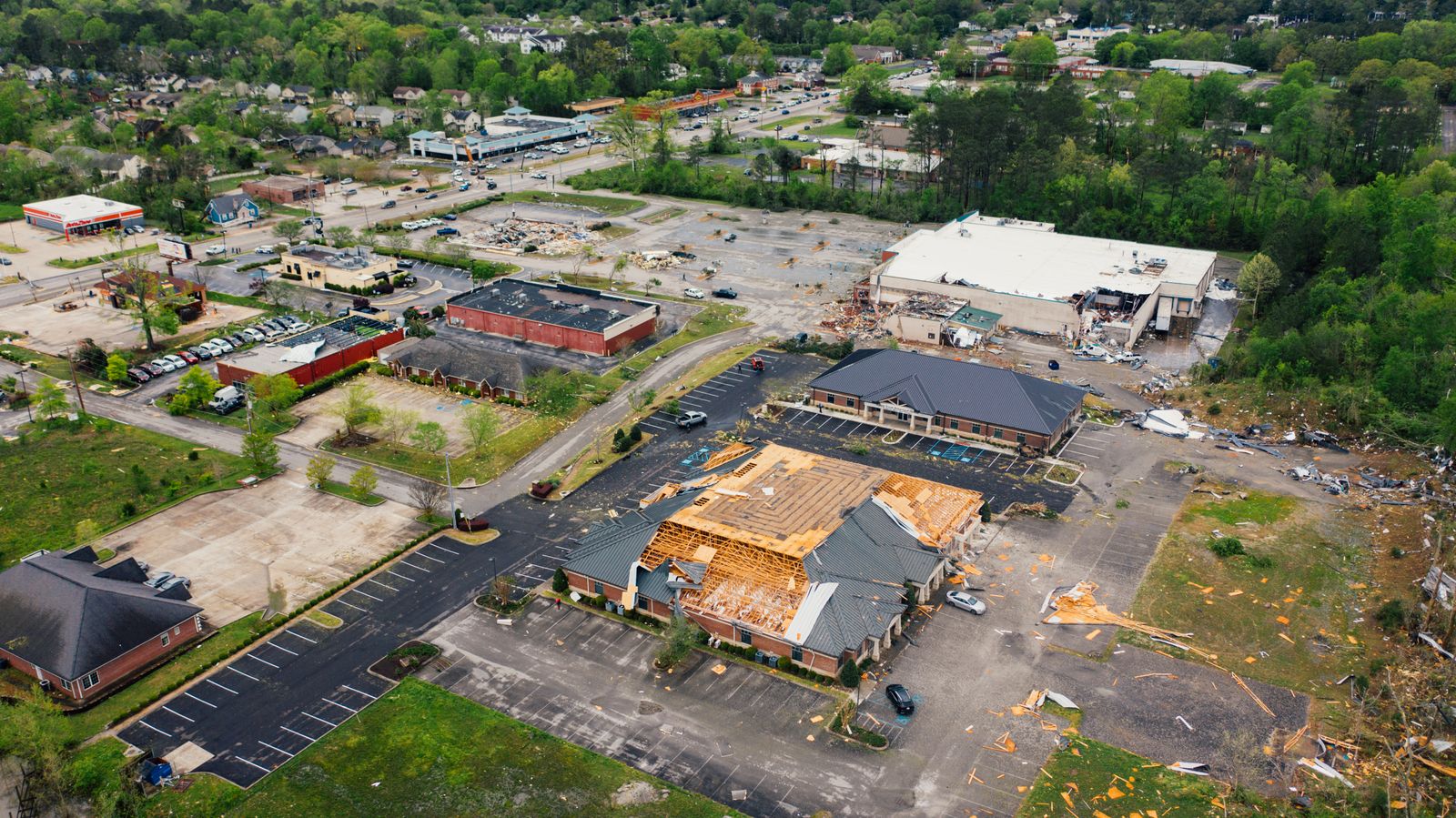 Aerial view of hurricane damage across commercial properties
