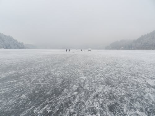 People Standing on Icerberg