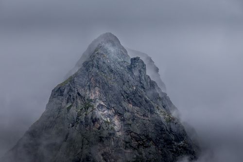 Free Dramatic mountain peak shrouded in mist and clouds, capturing nature's majesty in Sofia Province. Stock Photo