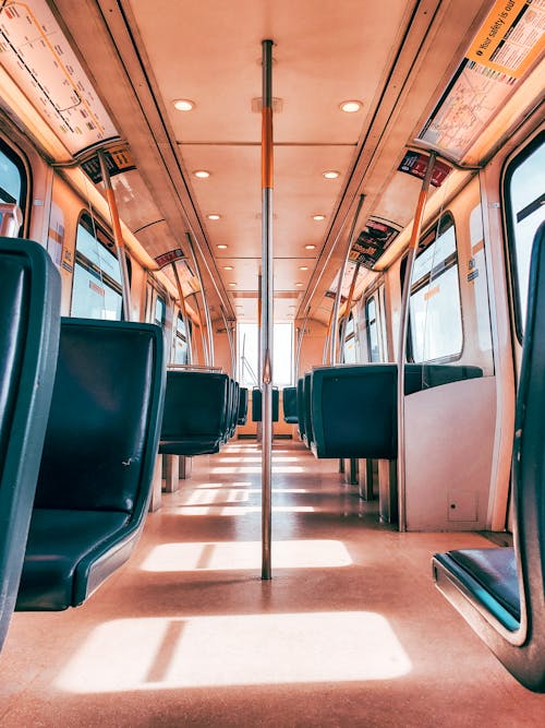 An Empty Blue Train Seats
