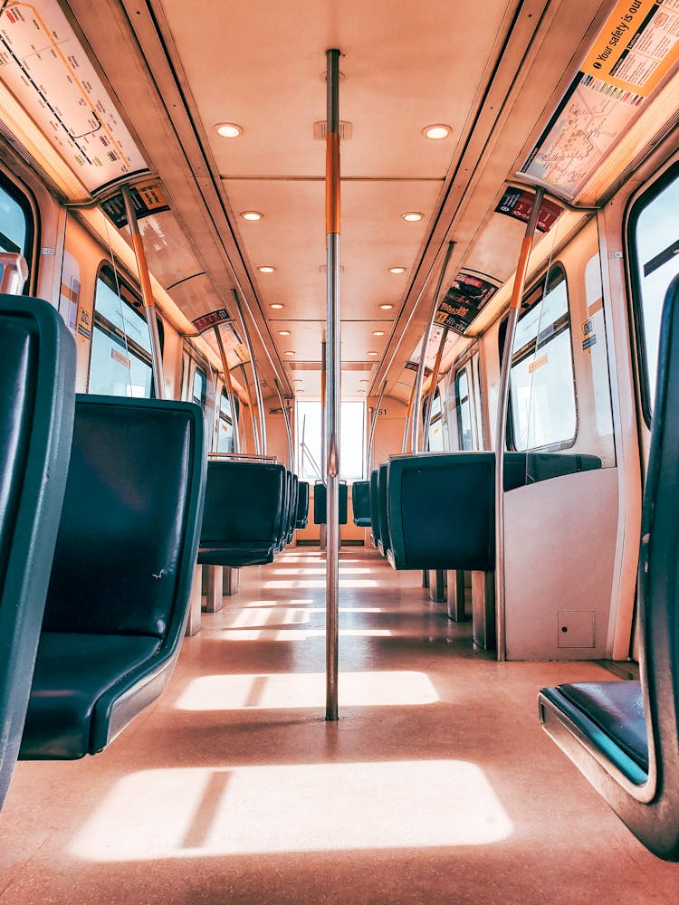 An Empty Blue Train Seats