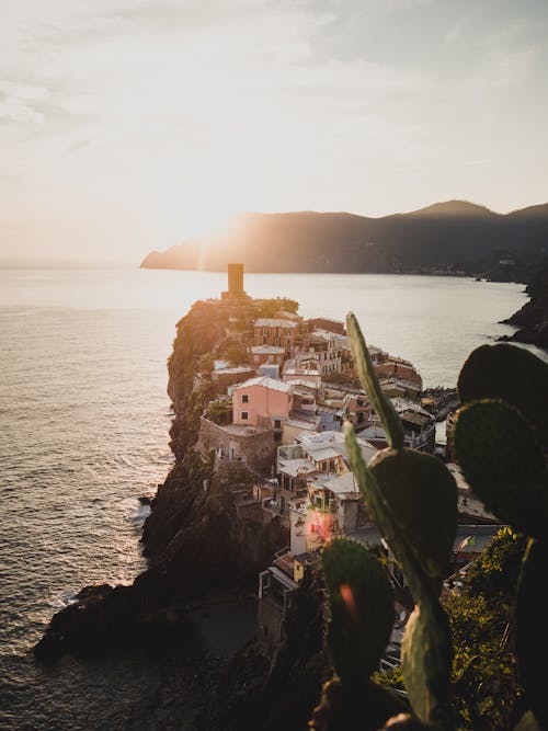 Free Aerial View of City Buildings Near the Ocean Stock Photo