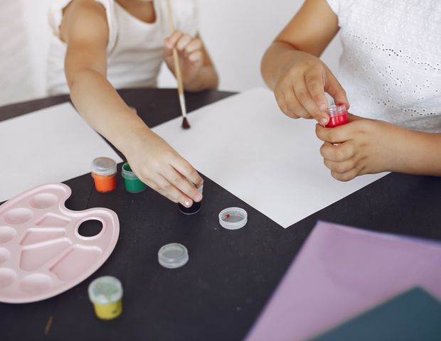 A warm, bright daycare classroom with toys and books