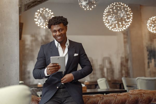 Restaurant owner reviewing their online ordering platform options on a laptop — choosing between GloriaFood alternatives in 2026