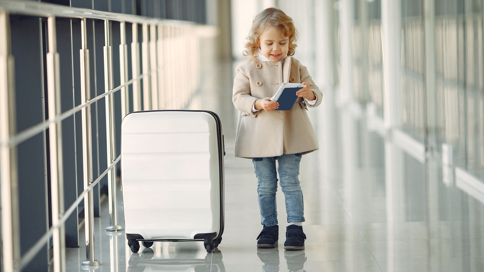 Teacher comparing travel notes and costs while choosing a TEFL destination