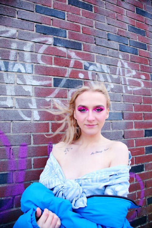 A Woman Wearing an Off Shoulder Top 