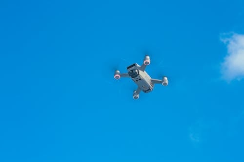 Free Modern drone against bright sky Stock Photo