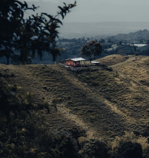 Small house on mountain slope