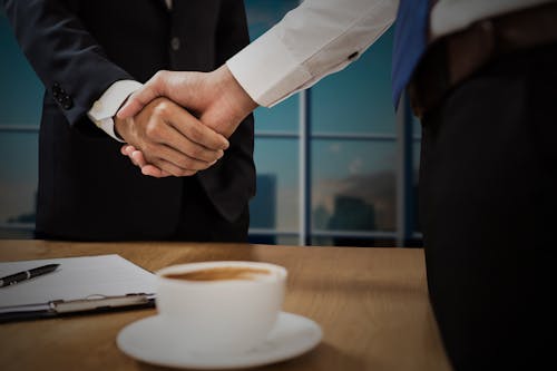 Free Two Men Making A Handshake Stock Photo