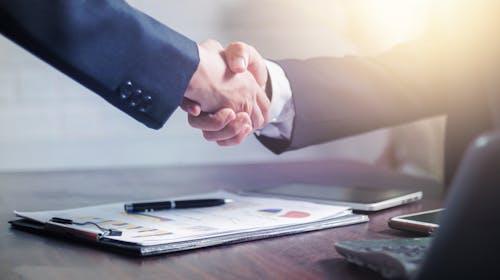 Free Two Men Making A Handshake Stock Photo