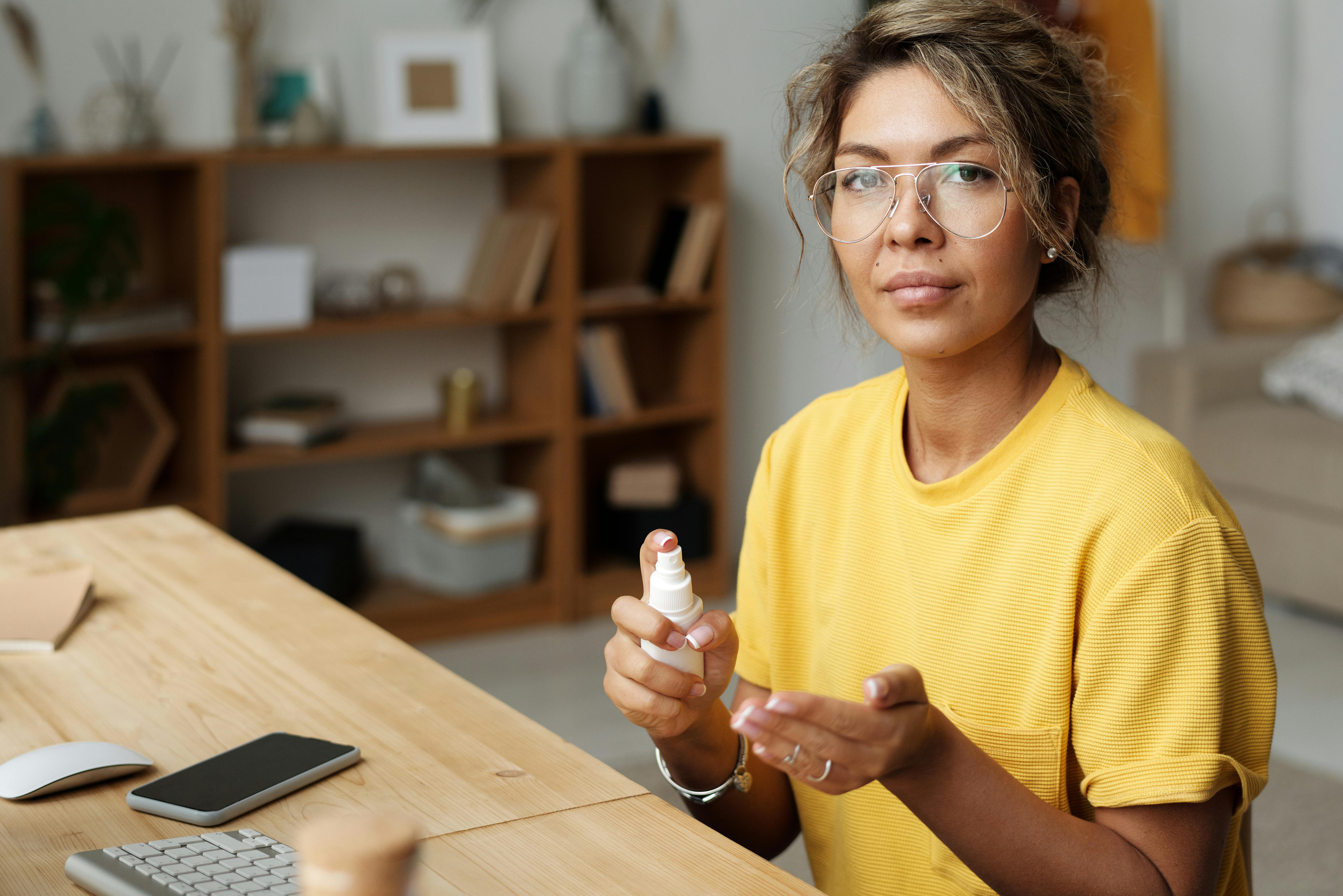 Woman Writing on a Notebook