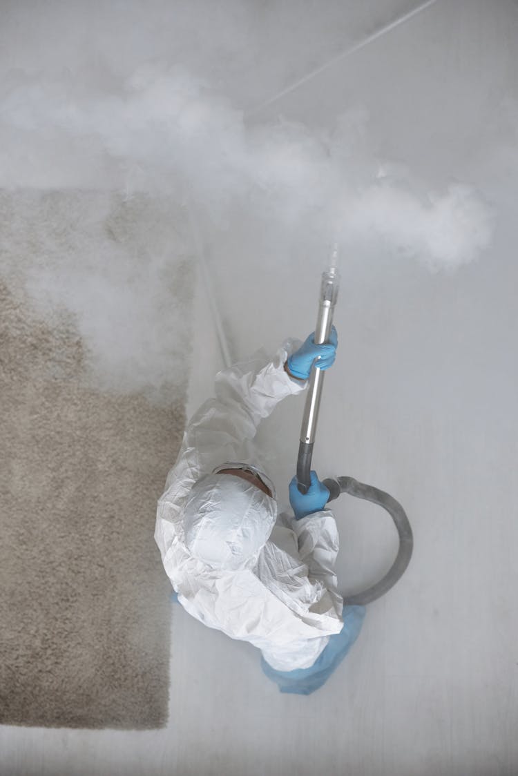 Person Fumigating A Room