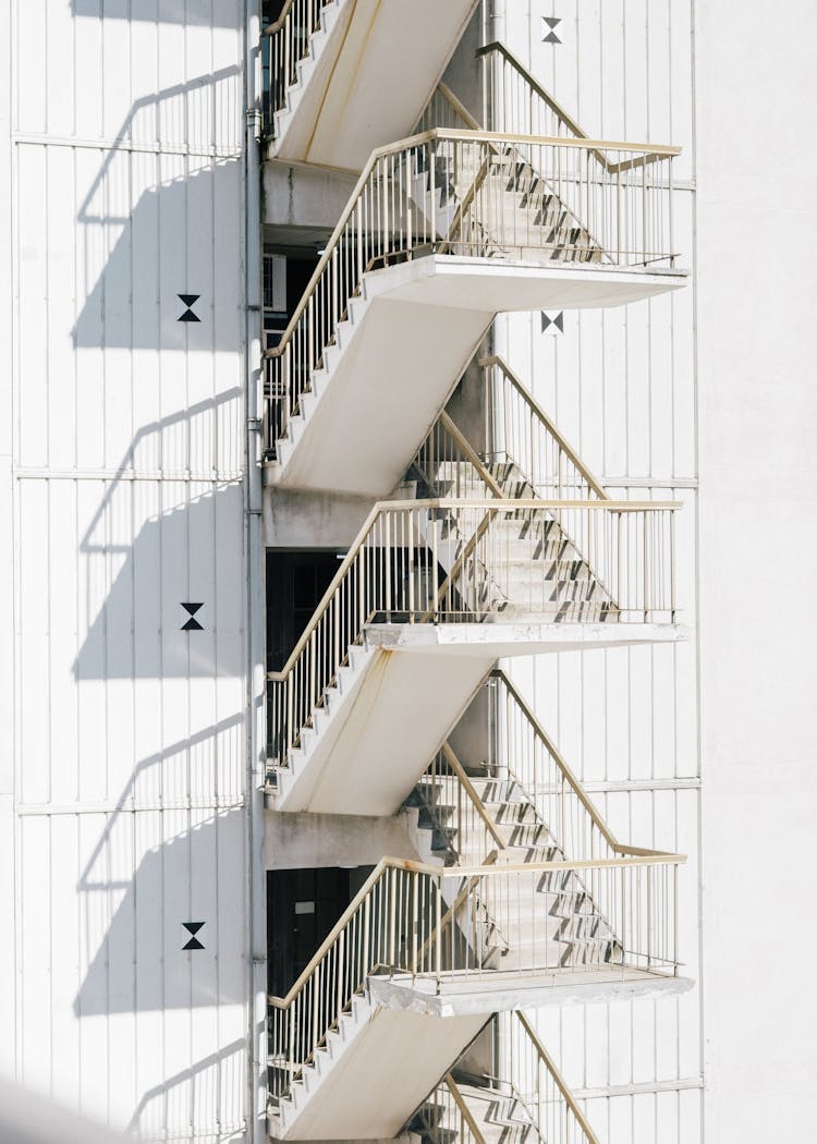 Modern Staircase Of White Building In Sunlight