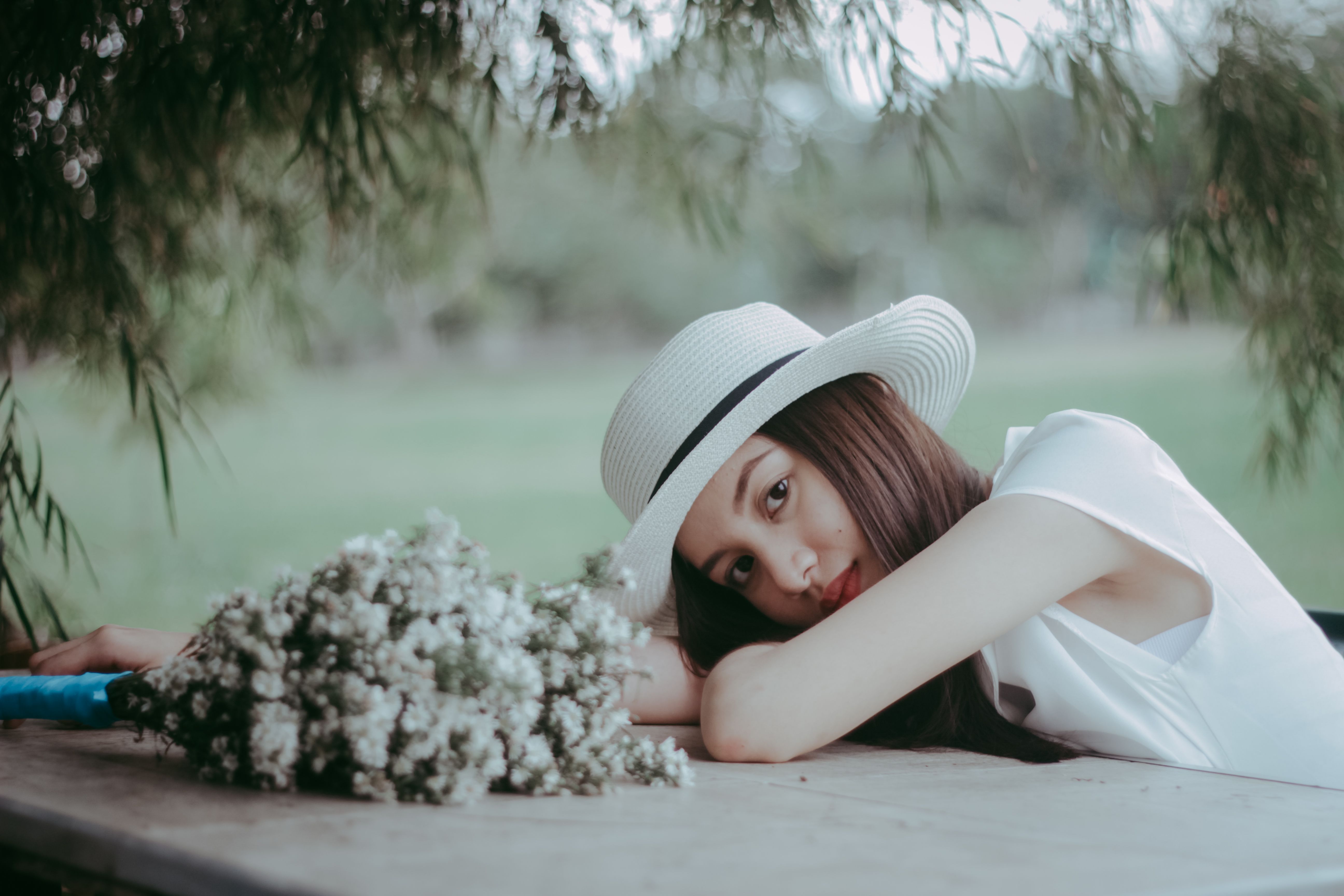 Elegant Woman lying on a Table Top · Free Stock Photo