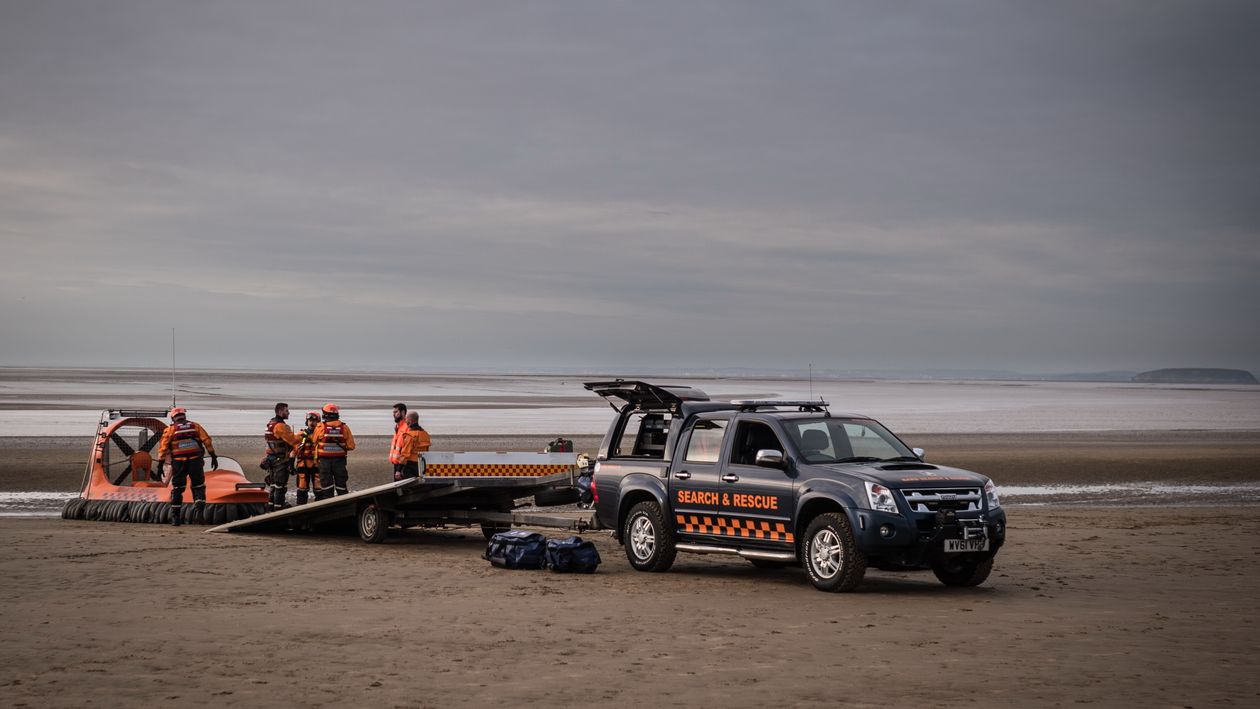 Rescue Pick Up Truck on Seashore · Free Stock Photo